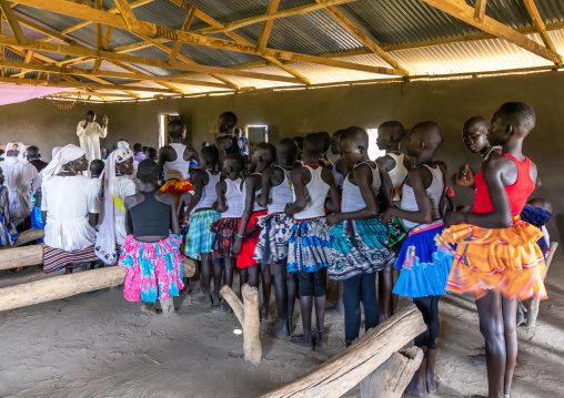 Mundari people dancing and singing during a sunday mass in a church, Central Equatoria, Terekeka, South Sudan
