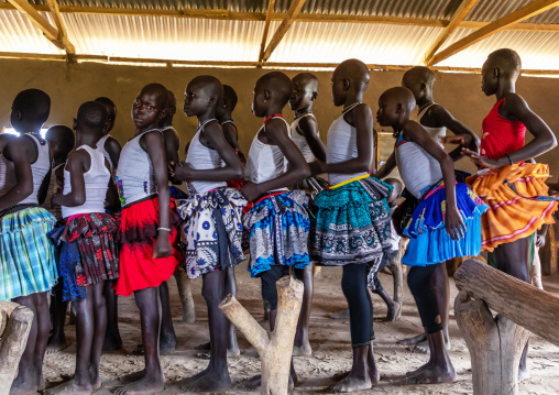 Mundari tribe girls dancing and singing during a sunday mass in a church, Central Equatoria, Terekeka, South Sudan
