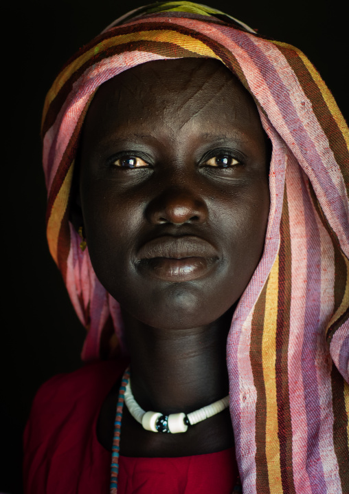 Portrait of a Mundari tribe woman with scarifications on the forehead, Central Equatoria, Terekeka, South Sudan