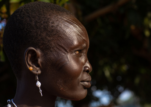 Side view of a Mundari tribe woman with scarifications on the forehead, Central Equatoria, Terekeka, South Sudan