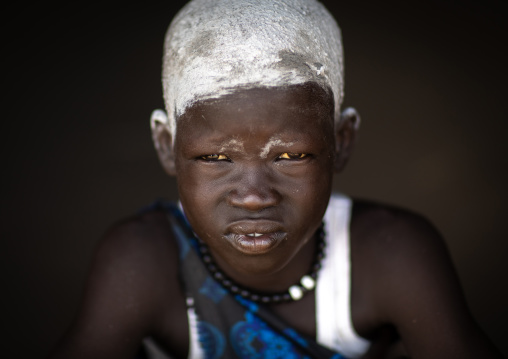 Portrait of a Mundari girl with ash on the head to dye her hair in red, Central Equatoria, Terekeka, South Sudan