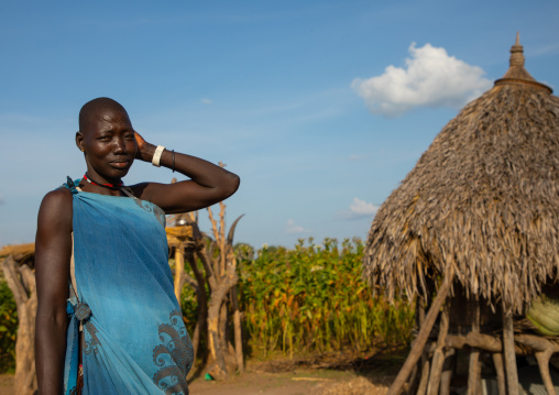 Portrait of a Mundari tribe woman in blue clothes, Central Equatoria, Terekeka, South Sudan