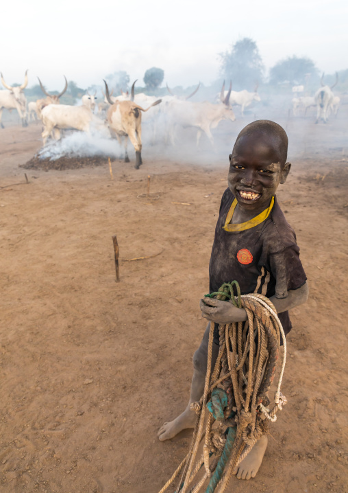 Portrait of a Mundari tribe boy with ropes for the cows, Central Equatoria, Terekeka, South Sudan