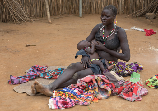 Larim tribe mother breastfeeding her child, Boya Mountains, Imatong, South Sudan