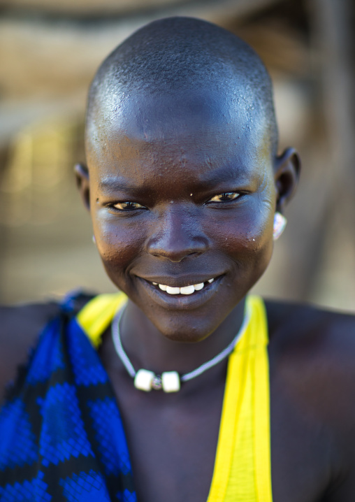 Portrait of a smiling Mundari tribe woman, Central Equatoria, Terekeka, South Sudan