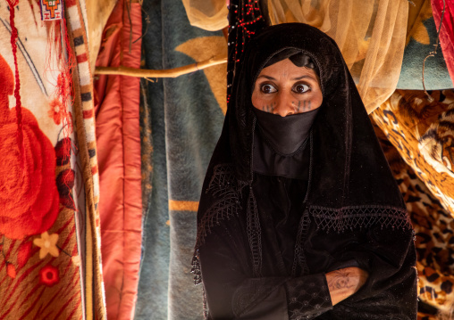 Portrait of a Rashaida tribe veiled woman inside her tent, Kassala State, Kassala, Sudan