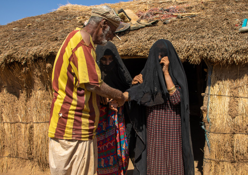 Rashaida old man with his veiled wives, Kassala State, Kassala, Sudan