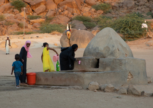 Sudanese people collecting water outside of Khatmiyah  mosque, Kassala State, Kassala, Sudan