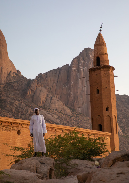 Muezzin making the call to prayers in front of Khatmiyah mosque at the base of the Taka mountains, Kassala State, Kassala, Sudan