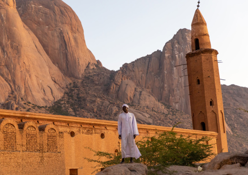Muezzin making the call to prayers in front of Khatmiyah mosque at the base of the Taka mountains, Kassala State, Kassala, Sudan