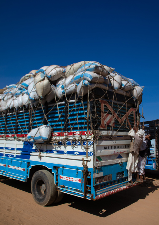 Children loading a truck in the market, Khartoum State, Omdurman, Sudan