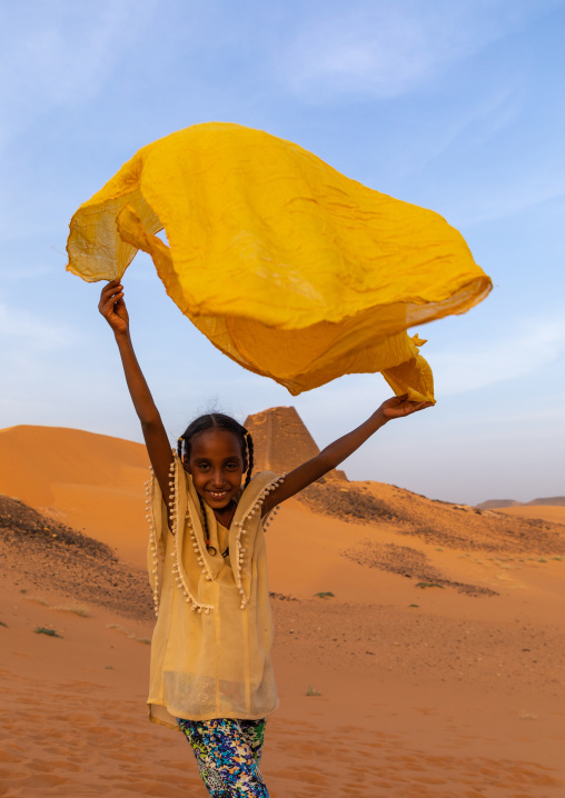 Portrait of sudanese girl visiting the pyramids of the kushite rulers at Meroe, Northern State, Meroe, Sudan