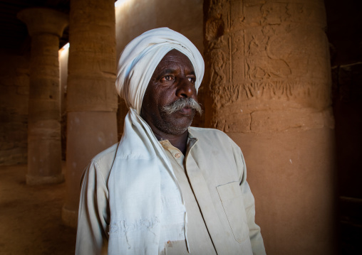 Sudanese man inside Musawwarat es-sufra meroitic lion temple, Nubia, Musawwarat es-Sufra, Sudan