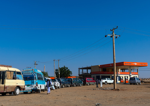 Sudanese people in their cars queue on line at a gas station during the fuel shortages, Red Sea State, Suakin, Sudan