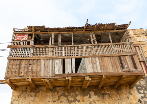 Old building with a wooden balcony on mainland, Red Sea State, Suakin, Sudan