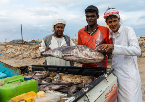 Fishermen with a big fish they catched, Red Sea State, Suakin, Sudan
