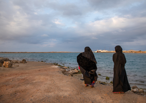 Rashaida tribe women looking at the sea, Red Sea State, Suakin, Sudan