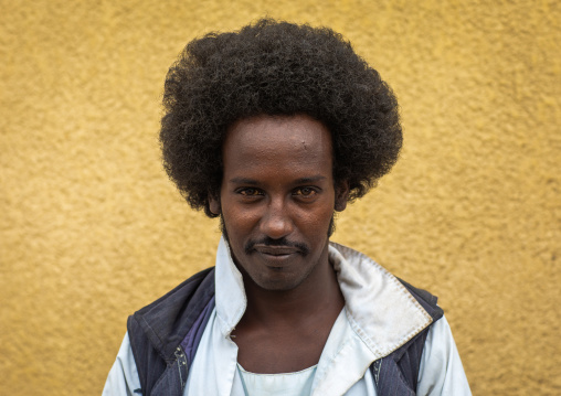 Portrait of a Beja tribe man with afro haircut, Red Sea State, Port Sudan, Sudan