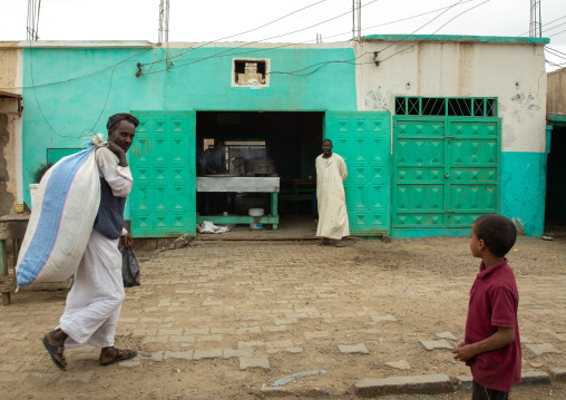 Beja tribe men in the street, Red Sea State, Port Sudan, Sudan