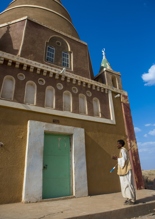 Sudan, Khor, Abu Haraz, man praying in front of a sufi shrine