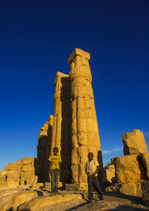 Sudan, Nubia, Soleb, kids in front of the big soleb temple built by amenophis iii