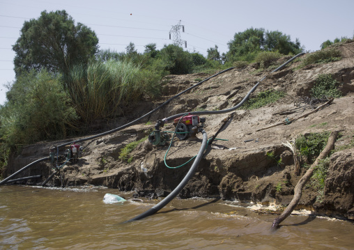 Sudan, Nubia, Sai island, pumps in river nile