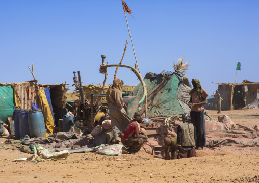 Sudan, Khartoum State, Alkhanag, men searching for gold