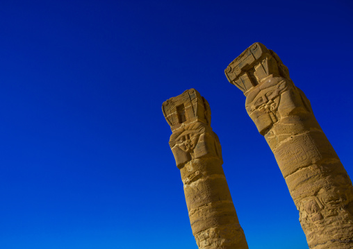 Sudan, Northern Province, Karima, hatoric style columns in the outer courtyard of the temple of amun and mut at the base of the jebel barkal