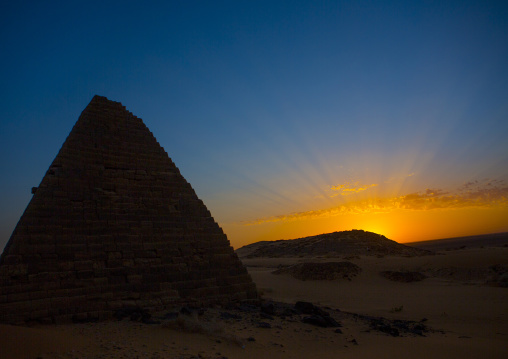 Sudan, Kush, Meroe, sunset over the pyramids and tombs in royal cemetery
