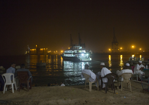 Sudan, Red Sea State, Port Sudan, people eating in a restaurant on the corniche