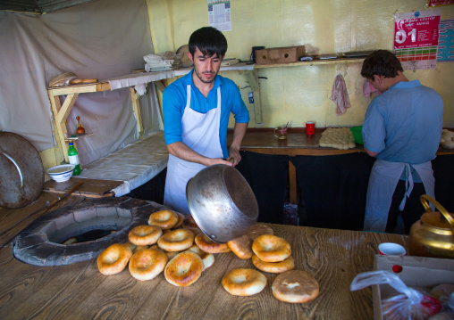 Tajik men making bread in a local bakery, Gorno-Badakhshan autonomous region, Khorog, Tajikistan