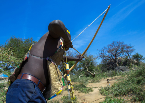 Tanzania, Serengeti Plateau, Lake Eyasi, hadzabe man with bow and arrow
