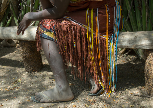 Tanzania, Serengeti Plateau, Lake Eyasi, datoga tribe woman wearing a leather dress