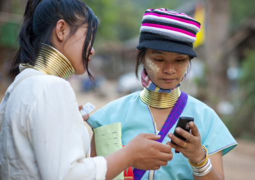 Long neck women using a phone, Mae hong son, Thailand