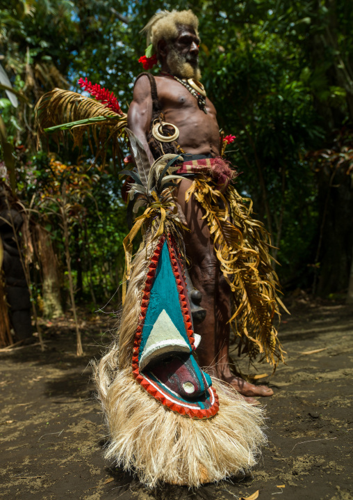 Portrait of chieftain Etul in front of Rom dance mask, Ambrym island, Fanla, Vanuatu