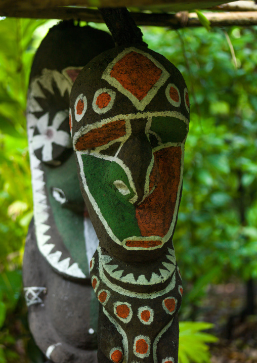 Painted slit gong drums in the jungle, Ambrym island, Olal, Vanuatu
