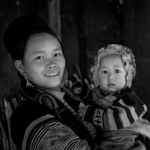 Black hmong mother and baby in traditional clothes, Sapa, Vietnam