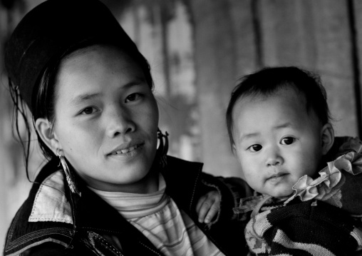 Black hmong mother and baby in traditional clothes, Sapa, Vietnam