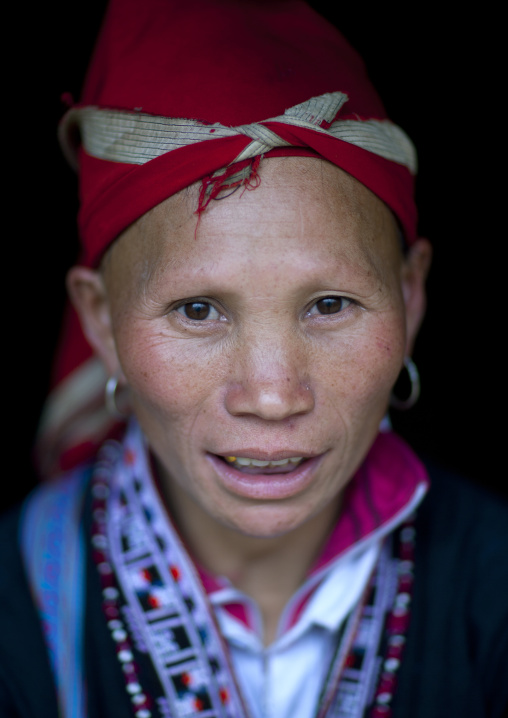 Red dzao woman with a red headscarf, Sapa, Vietnam