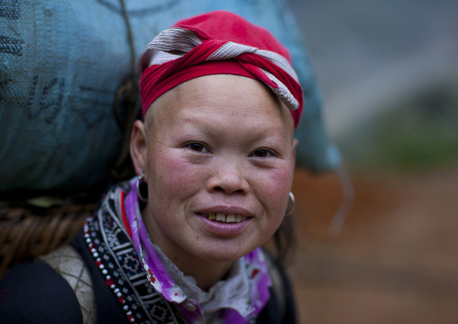 Red dzao woman with a red headscarf, Sapa, Vietnam