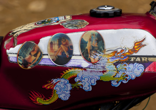 Motorike decorated with a dragon and bimbo pictures, Sapa, Vietnam