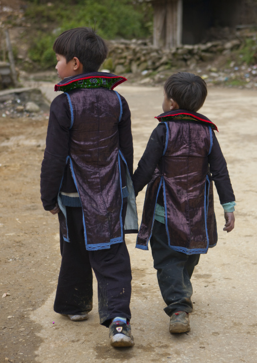Black hmong boys in traditional clothes, Sapa, Vietnam