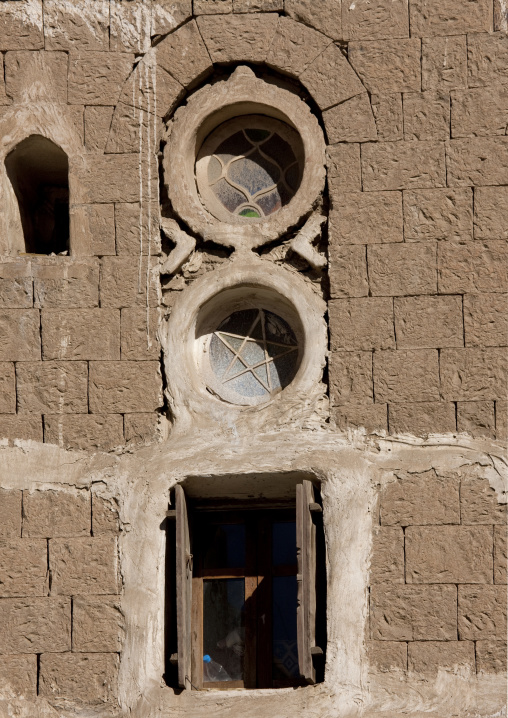 Small Round Stained Glass Windows On The Front Of A Typical House, Sanaa, Yemen
