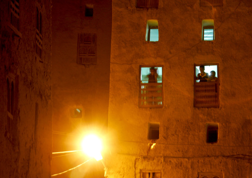 Children Showing Up At The Windows At Night, Shibam, Yemen