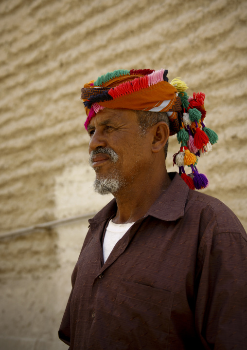 Profile Of An Old Man Wearing  A Colourful Turban With Bobbles, Hadramaut, Yemen