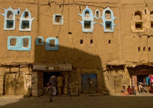 Shops In An Adobe Building With Blue Painted Windows, Amran, Yemen