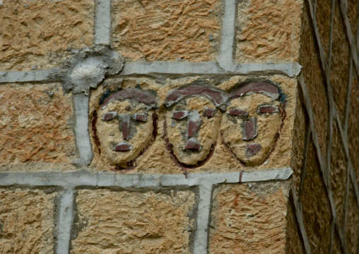 Three Faces Carved On A Wall, Ibb, Yemen