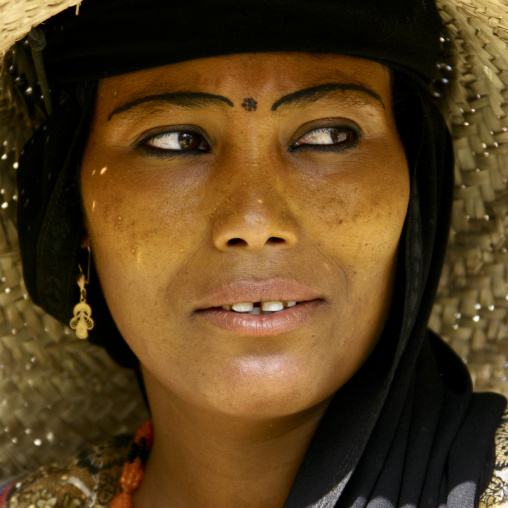 Portrait Of A Woman With Painted Eyebrows And Wearing A Straw Hat, Jebel Saber, Taiz, Yemen