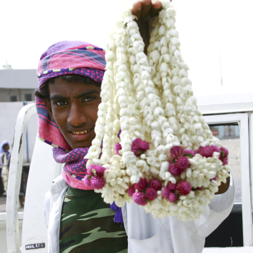 A Seller Showing Garlands Of Jasmin, Zabid, Yemen