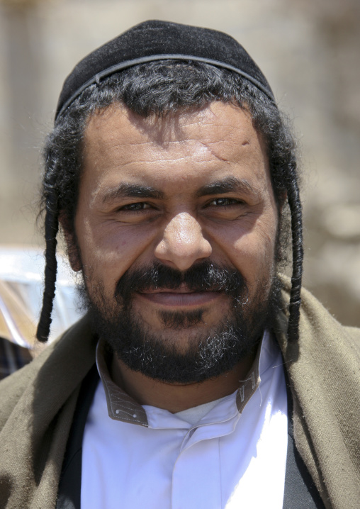 Jewish Man With Traditional Braids Smiling At The Camera, Amran, Yemen